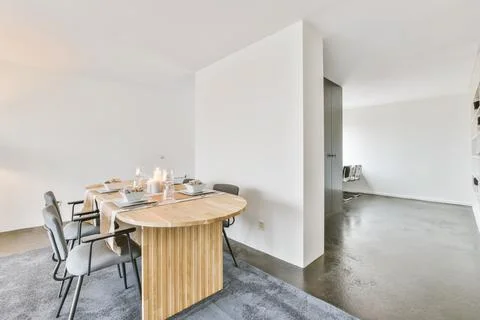 Served table in stylish dining room Stock Photos