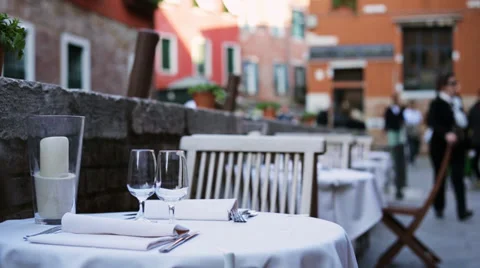 Served tables outside of restaurant waiting for clients Stock-Footage 37449297