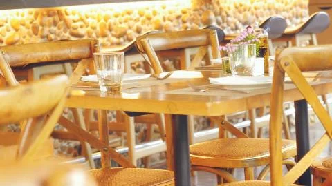 Served tables in a restaurant Stock Photos