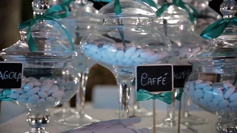 Served tables with wine glasses, white tablecloth and wooden chairs of wedding Video stock 71996097