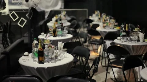 Served tables with wine, water and fruit waiting for the party Stock Footage 52817784