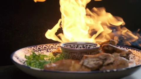 Served whole grilled chicken with flame Stock Footage 137744441
