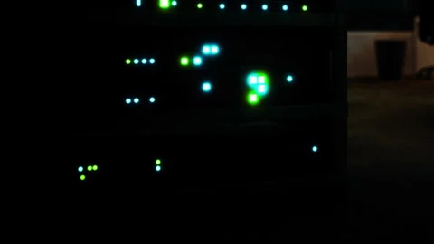 Server equipment in a dark room with glowing lights during night Stock Footage 345006042