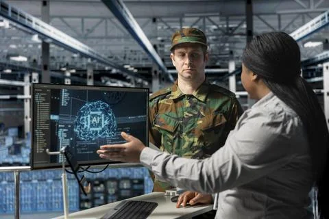 Server farm army workers interpreting AI systems output during mission planning 스톡 사진