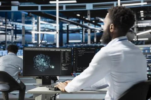 Server farm employee using AI algorithms clustering unstructured data Stock Photos