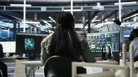 Server farm IT specialist using PC to apply artificial intelligence Video stock 307038469