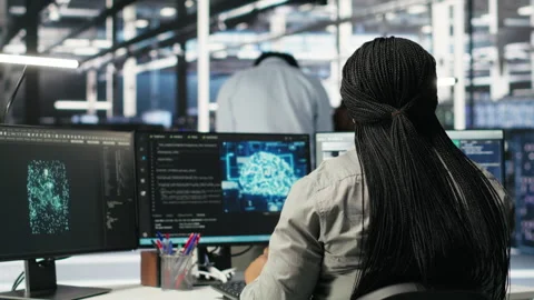 Server farm IT specialist using PC to apply artificial intelligence Stock Footage 308045166