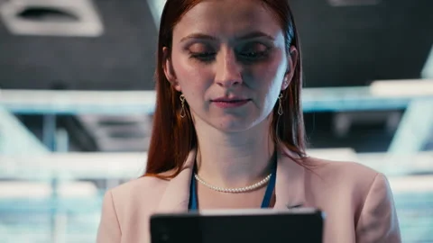 Server farm IT specialist using tablet app to do network management Stock Footage 330086814