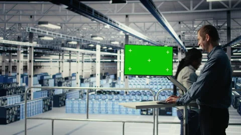 Server farm programmer using green screen computer to scan hardware rigs Stock Footage 314805276