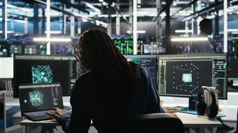 Server farm software developer interprets AI generated data analytics graphs Stock Footage 307042165