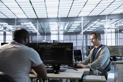 Server farm specialists expert configuring and testing hardware Stock Photos