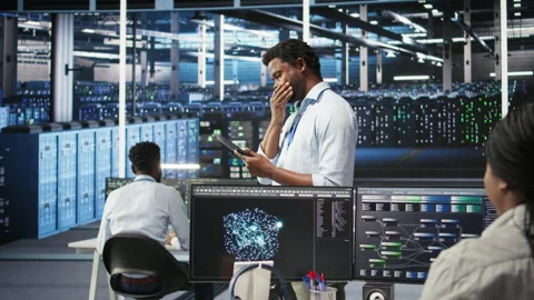 Server farm technician using AI algorithms and node tree systems Stock Footage 307016054