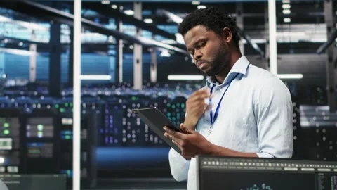 Server farm technician using AI algorithms and node tree systems Stock Footage 309507400