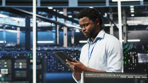 Server farm technician using AI algorithms and node tree systems Stock Photos
