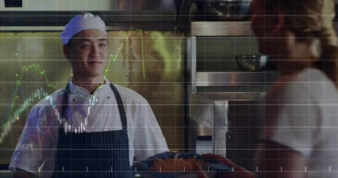 Server handing plate to chef for restaurant, chef seeing line chart overlaying Video stock 331736280