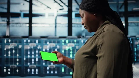 Server hub admin uses isolated screen smartphone to watch video tutorial Stock Footage 317202581