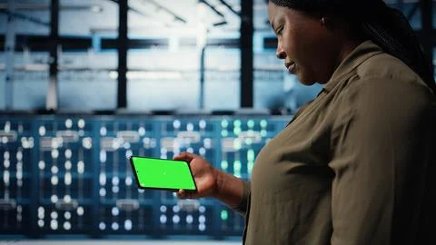 Server hub admin uses isolated screen smartphone to watch video tutorial Foto stock