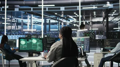 Server hub coworkers react to security breach after unauthorized access Stock Footage 309508861