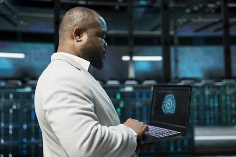 Server hub developer using AI technology to fix network issues affecting rigs Stock Photos