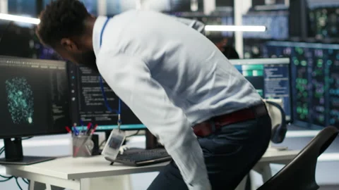 Server hub engineering team interprets AI generated data analytics graphs Stock Footage 308044729