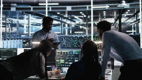 Server hub engineering team working together, using node tree software Stock Footage 309510970