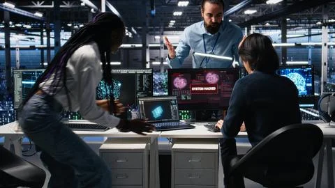 Server hub engineers alarmed by cyberattack accessing confidential data Stock Photos