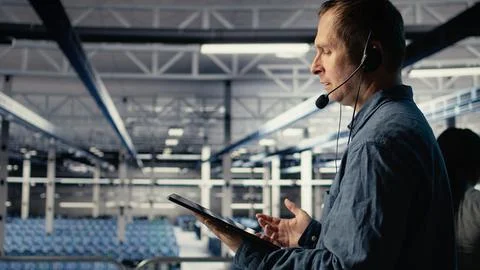 Server hub IT expert guides clients through setting up secure data backups Stock Photos