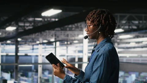 Server hub IT expert monitors systems, doing tech support Stock Footage 310278413