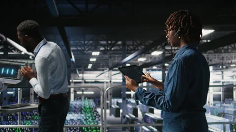 Server hub IT expert monitors systems, doing tech support Stock Footage 310278968