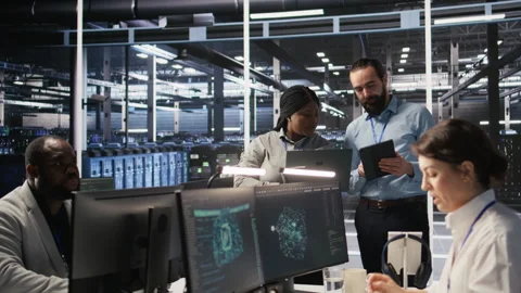 Server hub supervisor overseeing computer scientists improving neural network Stock Footage 309630266