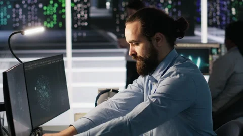 Server hub worker arranging desk objects to optimize efficiency during tasks Stock Footage 309620069