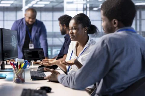 Server hub worker failing to debug and optimize code, shrugging shoulders Stock Photos