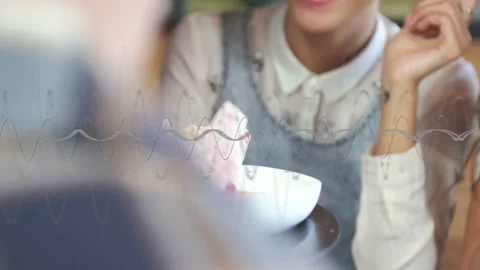 Server moving tray to restaurant diners reaching for skewered burger basket via Stock Footage 333132700