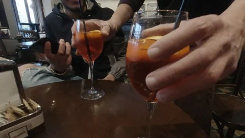 Server putting two Drinks on Table, Milan Stock Footage 127329251