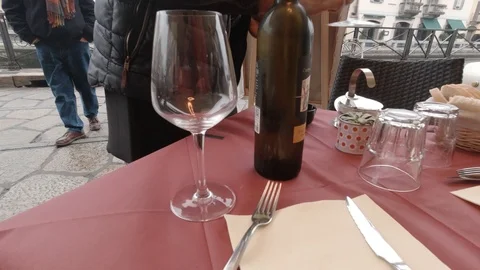 Server putting Wine glasses in Milan, Italy  Stock Footage 127329198