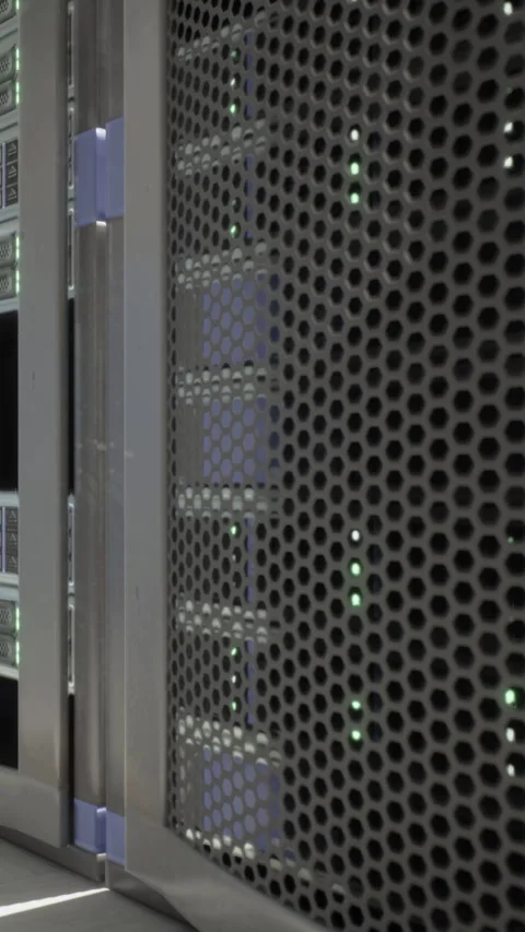 Server rack with blinking lights in a data center during daytime hours Stock Footage 337925026