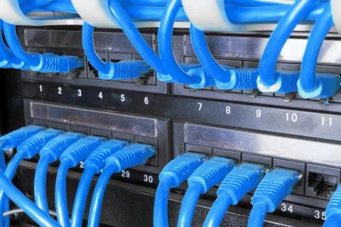 Server rack with blue cables Stock Photos