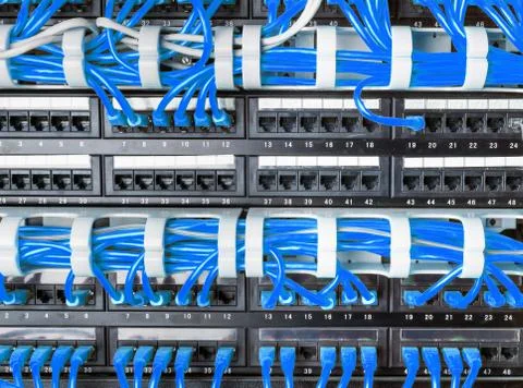 Server rack with blue cables Stock Photos