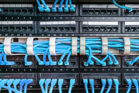 Server rack with blue cables Stock Photos