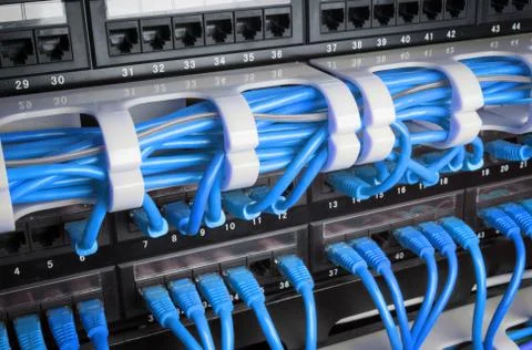 Server rack with blue cables Stock Photos