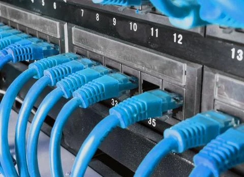 Server rack with blue cables Stock Photos