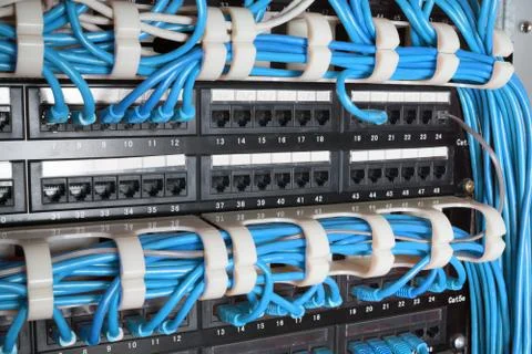 Server rack with blue cables Stock Photos