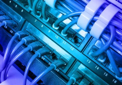 Server rack with blue internet patch cord cables Stock Photos