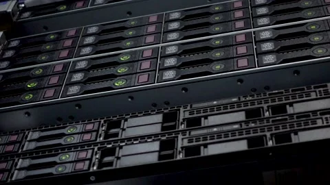 Server rack cluster in a data center. Many HDD SATA Stock Footage 134435162