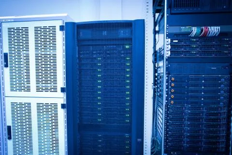 Server rack cluster in a data center (shallow DOF; color toned i Foto stock