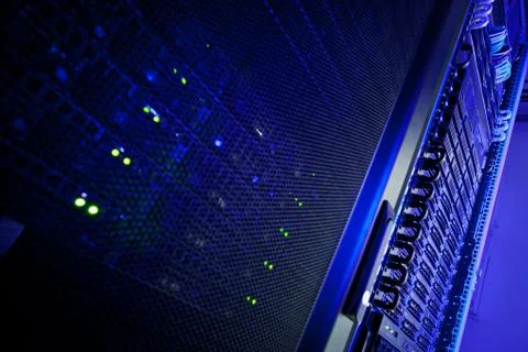 Server rack cluster in a data center (shallow DOF; color toned i Foto stock