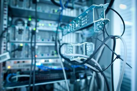 Server rack cluster in a data center (shallow DOF; color toned i Foto stock