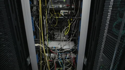 Server Rack with Dense Network Cabling Inside Data Center Stock Footage 330542220