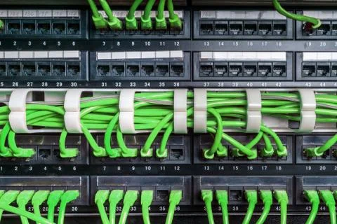 Server rack with green cables Stock Photos