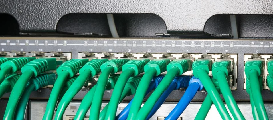 Server rack with green cables Stock Photos